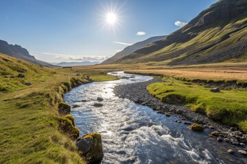 Sunlight Reflecting on a Winding Stream Flowing Through a Mountain Valley