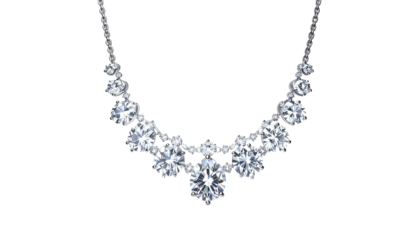 A stunning necklace of round, sparkling stones arranged in a graceful, downward-facing crescent shape, against a black backdrop