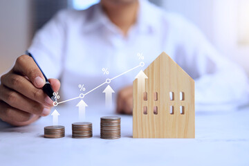 inflation concept with businessman writing a graph on increase inflation real estate inflation rate effect to mortgage interest is higher