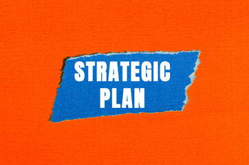 Strategic Plan message written on ripped torn paper background. Conceptual Strategic Plan symbol. Copy space.