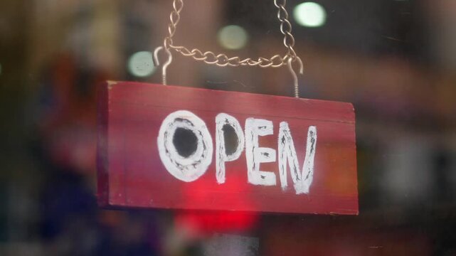 Store welcomes customers with an open sign at night