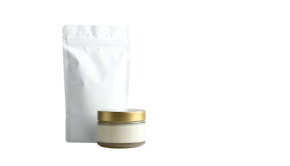 A white pouch stands beside a small jar with a gold lid, both on a black backdrop, suggesting product packaging