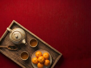 Authentic Asian Tea Ceremony with Mandarins on Red