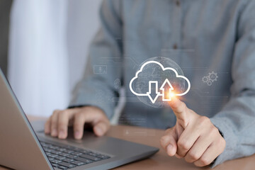 The data cloud symbol on the hand of a businessman represents global communication data storage technology.