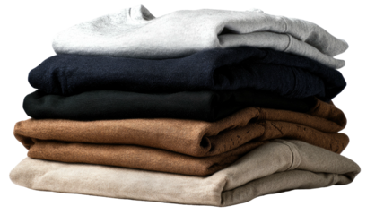 Stacked folded sweaters in neutral hues, textured knit