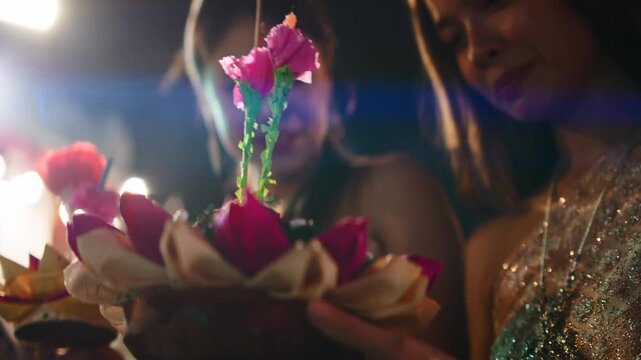 Asian women celebrating loi krathong festival