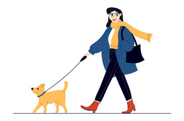 A woman walks a small dog wearing a coat and scarf.
