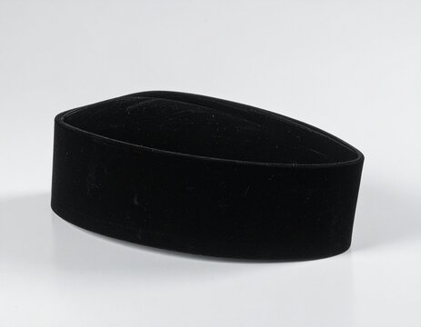 Side Profile of Black Velvet Songkok Peci Isolated on White