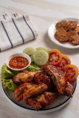 Ayam Goreng Lengkuas Kremes or Galangal Fried Chicken, One of Indonesia's culinary icons. Perfect for recipes, articles or any cooking content.