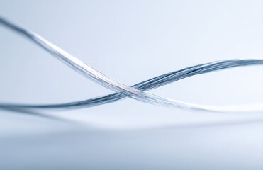 Abstract Dental Floss Strands Crossing on Light Background