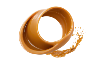 Caramel swirl, a liquid ribbon, with splatters on black