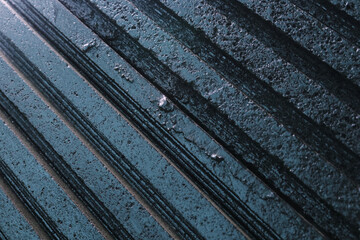 Close up of Painted Blue Wood Panels With Water Droplets on the Surface
