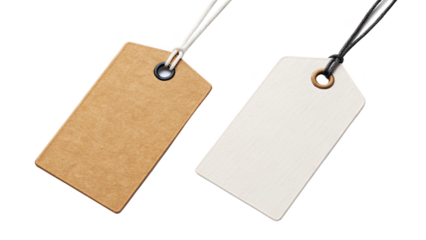 Two blank price tags on strings isolated on black background