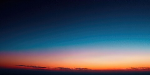 Sunset Horizon: The sky transitions from a deep, mesmerizing blue to vibrant orange hues, creating a tranquil and picturesque panorama. 