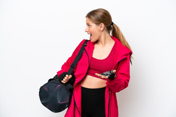 Young caucasian sport woman isolated on white background with surprise facial expression