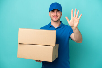 Delivery caucasian man isolated on blue background counting five with fingers