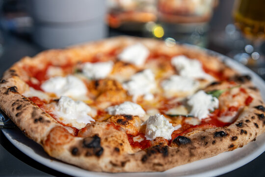 Close-up of Pizza Margherita Bufala served at an Italian restaurant 