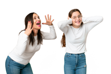 mother and daughter over isolated chroma key background frustrated and shouting