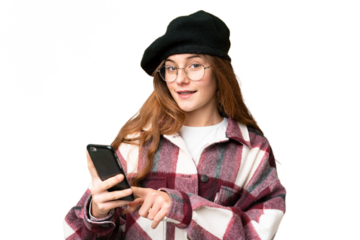 Teenager girl over isolated chroma key background sending a message or email with the mobile
