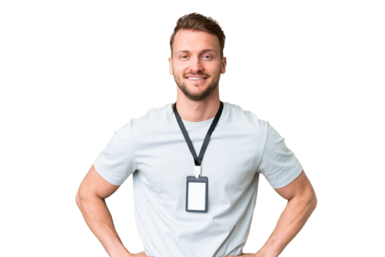 Young caucasian man with ID card over isolated chroma key background posing with arms at hip and smiling - Powered by Adobe