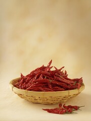 Freshly Sun-Dried Red Peppers in a Basket