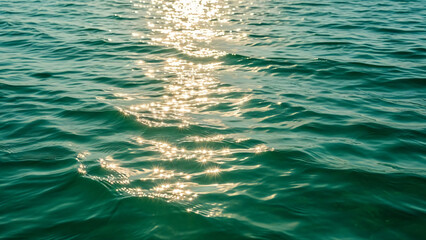 Bright sun reflecting on blue ocean water surface with sparkling water ripples, banner template perfect for travel, nature, tranquility, and vacation concepts.