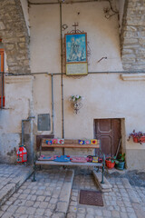 A bench decorated with ornaments on a street in Fossalto, a town in Molise, Italy.