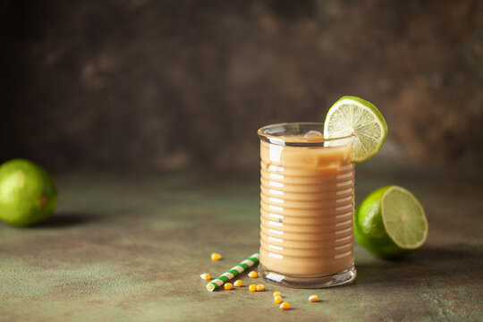 Tejuino traditional mexican drink with corn and lime. Copy space