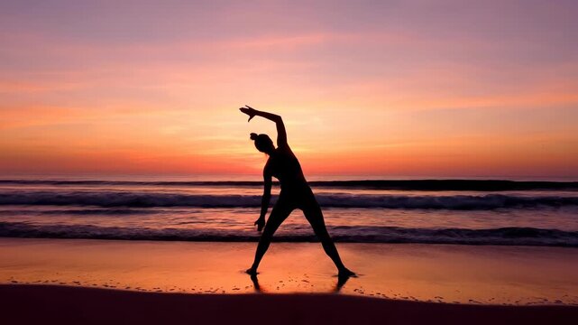Silhouette of woman practicing yoga tree pose on cliff edge at sunset with ocean background, meditation and wellness concept