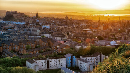 Sunset panoramic view over Edinburgh city from Arthurs Seat hill in Scotland