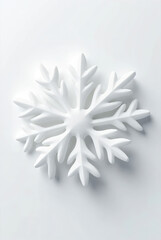 3D crystal snowflake icon with a blue frost design on a white background for winter holiday and Christmas decoration