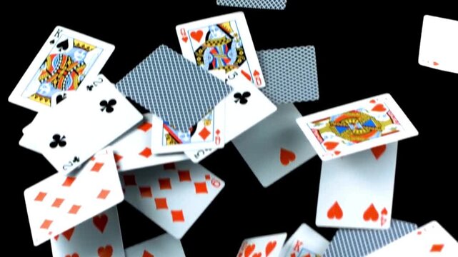Scattered playing cards in midair showing various suits and values