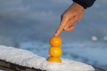 Winter composition with juicy ripe tangerines.