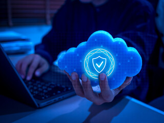 Cloud security technology background concept showing a person holding a digital cloud icon with a security shield symbol. Cyber protection, data privacy, secure storage, and modern IT infrastructure.
