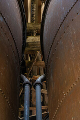 Abandoned industrial boiler room tanks