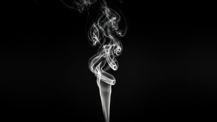 wisps of smoke rising against a black background.