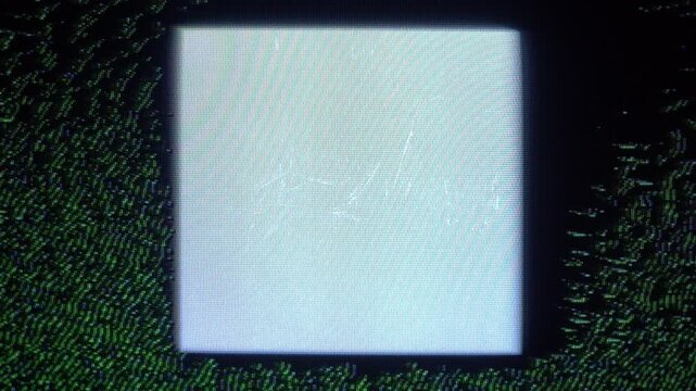 A large, light-colored square display screen with faint textures, surrounded by a dark green, pixelated, abstract digital background.