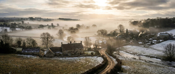 Cinematic Winter Morning Fog Over Rural Village Landscape
