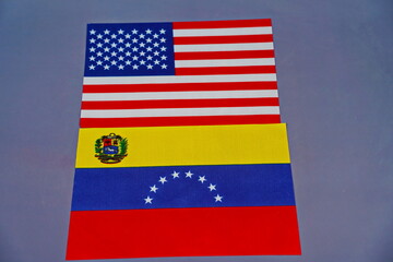 The flag of Venezuela and the United States. Conflict, economic sanctions, confrontation.