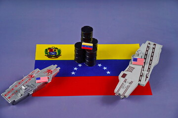 The flag of Venezuela, barrels of oil and American military equipment. Confrontation, conflict.