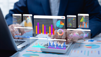 Analyst using digital dashboard with data science charts, big data analytics, and KPI metrics to enhance strategic data management, business insights, and organizational performance.