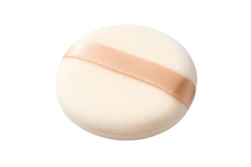 Round powder puff with a beige ribbon for makeup application, professional cosmetic accessory