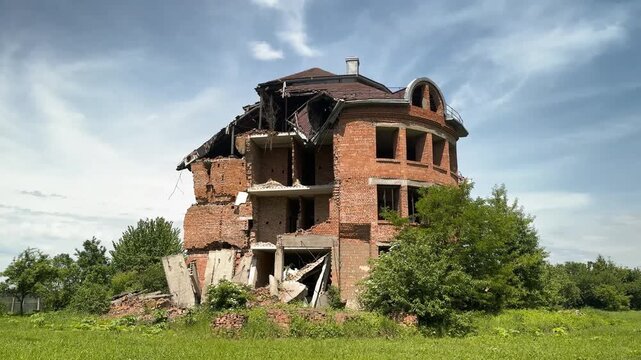 A strange house-palace in Ukraine, forgotten and crumbling, as if during a military bombing in war. The owner is missing, the property abandoned.