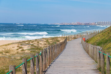 Wooden boardwalk along the Atlantic ocean coast, Portugal