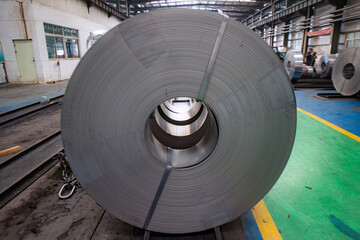 Close up of hot-rolled steel coils and strips, metal sheet industry