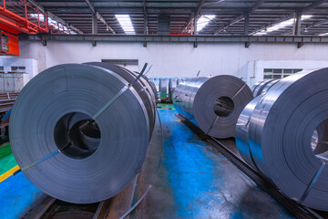 Close up of hot-rolled steel coils and strips, metal sheet industry