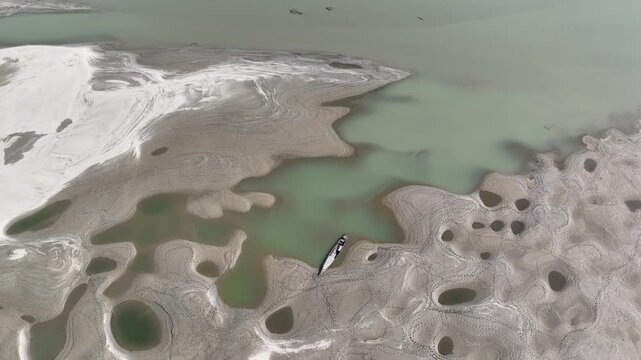 Huge sandbars arise in river Jamuna when the water level drops during the dry season. The striking pattern and textures look like desert when seen from above. Aerial sandbar view