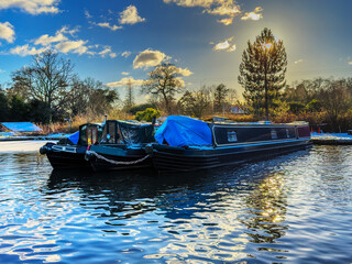 uk canal in winter with snow and frost