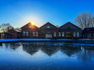 uk canal in winter with snow and frost