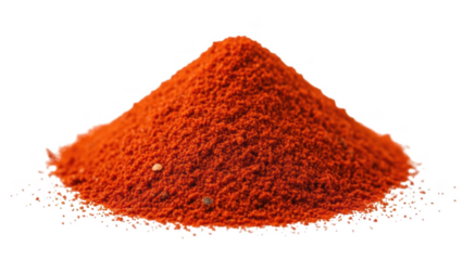 Pile of vibrant orange powder against a stark black background spice ingredient